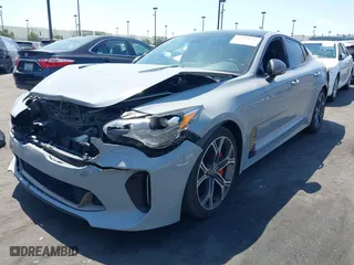 2018 Kia Stinger GT1 with VIN KNAE45LC7J6034168, listed as a IAAI auction lot 41979658 with 111,854 mi miles. Bid and sale history available at carsss.com. Image 2.
