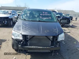 2019 Dodge Grand Caravan SXT with VIN 2C4RDGCG1KR514123, listed as a IAAI auction lot 41777811 with 119,087 mi miles and . Bid and sale history available at DreamBid. Image 13.