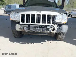2008 Jeep Grand Cherokee Laredo with VIN 1J8GR48K18C222454, listed as a IAAI auction lot 42047541 with 180,145 mi miles. Bid and sale history available at carsss.com. Image 6.