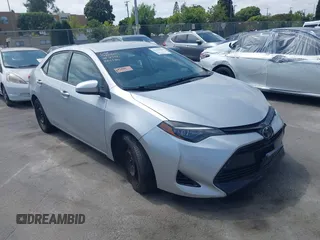 2018 Toyota Corolla L z VIN 2T1BURHE4JC068732, wystawiony jako IAAI lot #42444043 z przebiegiem 100 724 mil mil oraz . Historia ofert i sprzedaży dostępna na DreamBid. Obrazek 1.