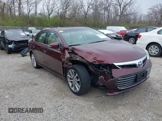 2014 Toyota Avalon Limited with VIN 4T1BK1EB5EU124568, listed as a IAAI auction lot 41996280 with 102,440 mi miles. Bid and sale history available at carsss.com. Image 1.