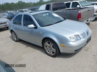 2002 Volkswagen Jetta GLS z VIN 3VWSE69M92M155565, wystawiony jako IAAI lot #42589622 z przebiegiem 110 781 mil mil oraz . Historia ofert i sprzedaży dostępna na DreamBid. Obrazek 1.