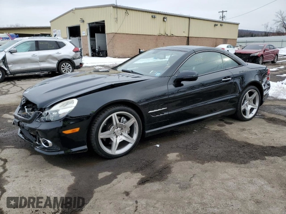 2009 Mercedes-Benz SL 550 with VIN WDBSK71F29F152210, listed as a Copart auction lot 44854165 with 69,777 mi miles and Salvage title. Bid and sale history available at DreamBid. Image 1.