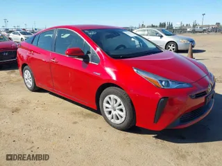 2022 Toyota Prius L Eco with VIN JTDKAMFU0N3161557, listed as a IAAI auction lot 41760623 with 135,934 mi miles. Bid and sale history available at carsss.com. Image 1.