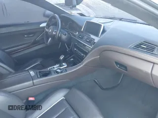 2015 BMW 6 Series 650i with VIN WBAYM9C59FD248412, listed as a IAAI auction lot 41855265 with 1,032,951 mi miles and . Bid and sale history available at DreamBid. Image 5.