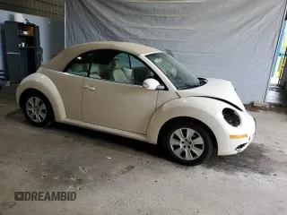 2009 Volkswagen Beetle S with VIN 3VWRG31Y39M402031, listed as a Copart auction lot 57285455 with 101,220 mi miles and Salvage title. Bid and sale history available at DreamBid. Image 4.