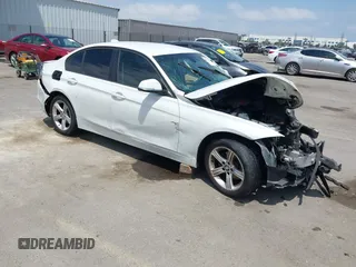 2014 BMW 3 Series 320i with VIN WBA3B1G59ENS78028, listed as a IAAI auction lot 42164754 with Not provided miles and . Bid and sale history available at DreamBid. Image 1.