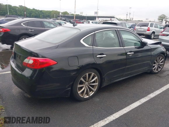 2011 Infiniti M z VIN JN1BY1AP1BM320784, wystawiony jako IAAI lot #42369027 z przebiegiem 256 664 mil mil oraz . Historia ofert i sprzedaży dostępna na DreamBid. Obrazek 4.