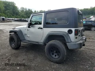 2007 Jeep Wrangler X with VIN 1J4FA24117L202404, listed as a Copart auction lot 58690485 with 126,347 mi miles and Salvage title. Bid and sale history available at DreamBid. Image 2.