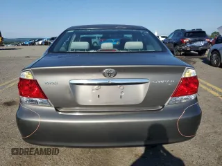 2006 Toyota Camry STD with VIN 4T1BE30K36U711539, listed as a Copart auction lot 65650005 with 135,763 mi miles and Salvage title. Bid and sale history available at DreamBid. Image 6.