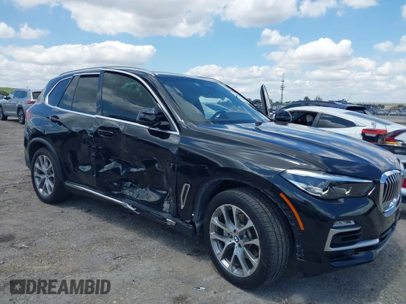 2019 BMW X5 xDrive40i with VIN 5UXCR6C59KLL23735, listed as a IAAI auction lot 41999791 with 31,072 mi miles. Bid and sale history available at carsss.com. Image 6.