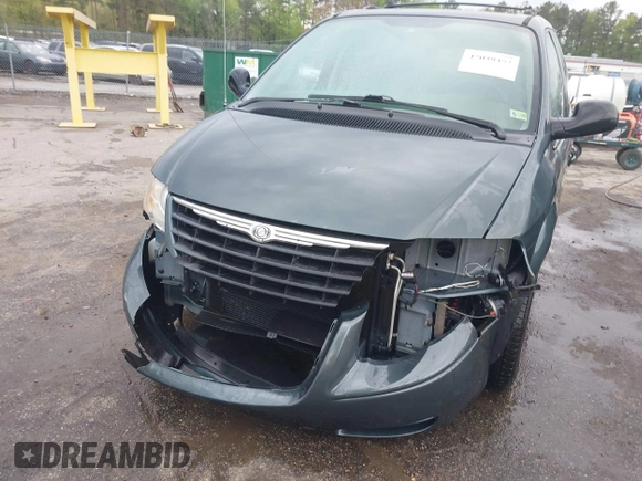2006 Chrysler Town & Country LX with VIN 2A4GP44R96R615942, listed as a IAAI auction lot 42039452 with 158,009 mi miles and . Bid and sale history available at DreamBid. Image 6.