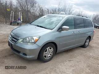 2007 Honda Odyssey EX-L with VIN 5FNRL38717B018097, listed as a IAAI auction lot 42028592 with 141,004 mi miles and . Bid and sale history available at DreamBid. Image 2.
