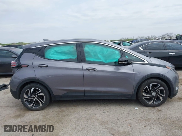2023 Chevrolet Bolt EV 2LT z VIN 1G1FX6S0XP4170965, wystawiony jako IAAI lot #41946627 z przebiegiem 18 477 mil mil oraz . Historia ofert i sprzedaży dostępna na DreamBid. Obrazek 13.