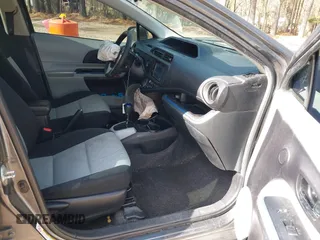 2013 Toyota Prius One with VIN JTDKDTB36D1046910, listed as a IAAI auction lot 41602468 with 194,828 mi miles and . Bid and sale history available at carsss.com. Image 5.