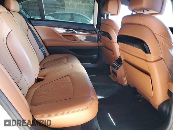 2016 BMW 7 Series 750i с VIN WBA7F0C56GGM20803, выставлен на аукционе Copart как лот 51183415 с пробегом 70 728 миль миль и Чистый • Clean title. История ставок и продаж доступна на DreamBid. Изображение 10.