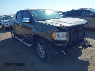 2015 GMC Canyon 2WD SLT with VIN 1GTG5CE33F1217775, listed as a IAAI auction lot 41485677 with 1 mi miles. Bid and sale history available at carsss.com. Image 1.