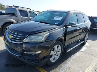 2016 Chevrolet Traverse LT with VIN 1GNKRGKD4GJ326001, listed as a IAAI auction lot 41826843 with 87,274 mi miles. Bid and sale history available at carsss.com. Image 2.