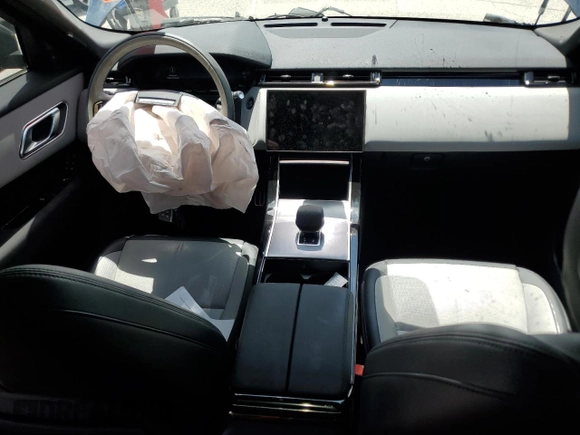 2024 Land Rover Range Rover Velar Dynamic SE с VIN SALYL2EX3RA369205, выставлен на аукционе Copart как лот 64060145 с пробегом 7 769 миль миль и Списание • Salvage title. История ставок и продаж доступна на DreamBid. Изображение 8.