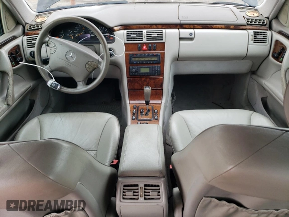 2000 Mercedes-Benz E-Class with VIN WDBJF65J5YB068297, listed as a Copart auction lot 69199004 with 236,751 mi miles and Salvage Title. Bid and sale history available at carsss.com. Image 8.