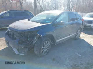 2020 Honda CR-V Touring with VIN 2HKRW2H9XLH605106, listed as a IAAI auction lot 41434008 with Not Provided miles and . Bid and sale history available at DreamBid. Image 18.