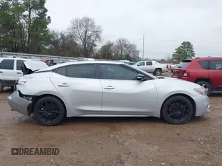 2018 Nissan Maxima SL z VIN 1N4AA6AP7JC390715, wystawiony jako IAAI lot #41397498 z przebiegiem 81 483 mil mil oraz . Historia ofert i sprzedaży dostępna na DreamBid. Obrazek 13.
