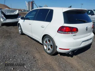 2010 Volkswagen GTI with VIN WVWHV7AJ3AW302532, listed as a IAAI auction lot 41794357 with 141,061 mi miles. Bid and sale history available at carsss.com. Image 3.