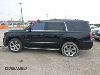 2016 GMC Yukon SLT with VIN 1GKS1BKC3GR272738, listed as a IAAI auction lot 41712439 with 169,726 mi miles. Bid and sale history available at carsss.com. Image 14.
