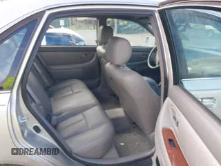 2000 Toyota Avalon XL z VIN 4T1BF28B1YU099727, wystawiony jako IAAI lot #41941010 z przebiegiem Nie podano mil oraz . Historia ofert i sprzedaży dostępna na DreamBid. Obrazek 8.