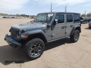 2023 Jeep Wrangler Rubicon z VIN 1C4JJXR66PW524701, wystawiony jako Copart lot #51703395 z przebiegiem 13 859 mil mil oraz Szkoda całkowita • Salvage title. Historia ofert i sprzedaży dostępna na DreamBid. Obrazek 1.