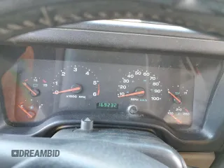 2003 Jeep Wrangler Sahara z VIN 1J4FA59S43P369233, wystawiony jako Copart lot #46517565 z przebiegiem 169 232 mil mil oraz Szkoda całkowita • Salvage title. Historia ofert i sprzedaży dostępna na DreamBid. Obrazek 9.