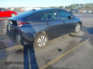 2017 Toyota Prius Two z VIN JTDKARFU4H3042976, wystawiony jako IAAI lot #41740418 z przebiegiem 66 734 mil mil oraz . Historia ofert i sprzedaży dostępna na DreamBid. Obrazek 4.