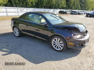 2012 Volkswagen Eos Komfort with VIN WVWBW7AH0CV001922, listed as a Copart auction lot 54378035 with 95,960 mi miles and Salvage Title. Bid and sale history available at DreamBid. Image 4.
