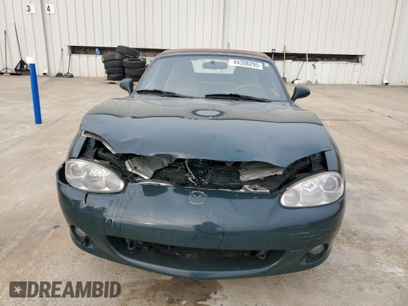 2001 Mazda MX-5 Miata z VIN JM1NB353810212392, wystawiony jako Copart lot #44398295 z przebiegiem 88 601 mil mil oraz Szkoda całkowita • Salvage title. Historia ofert i sprzedaży dostępna na DreamBid. Obrazek 5.