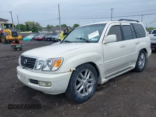 2000 Lexus LX 470 z VIN JT6HT00W8Y0096929, wystawiony jako IAAI lot #42316574 z przebiegiem 227 839 mil mil oraz . Historia ofert i sprzedaży dostępna na DreamBid. Obrazek 2.