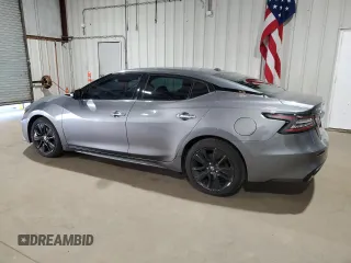 2019 Nissan Maxima SV z VIN 1N4AA6AV2KC360313, wystawiony jako Copart lot #52401595 z przebiegiem 67 822 mil mil oraz Czysty tytuł • Clean title. Historia ofert i sprzedaży dostępna na DreamBid. Obrazek 2.