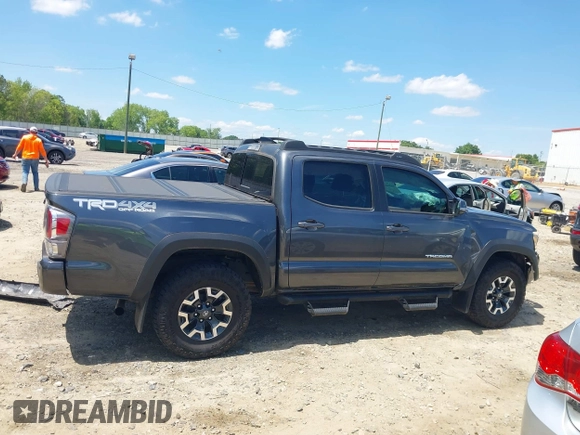 2023 Toyota Tacoma SR with VIN 3TMCZ5AN9PM553246, listed as a IAAI auction lot 42201812 with 20,907 mi miles and . Bid and sale history available at DreamBid. Image 14.