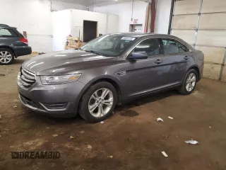 2014 Ford Taurus SEL z VIN 1FAHP2E85EG146469, wystawiony jako Copart lot #59506195 z przebiegiem 158 124 mil mil oraz Szkoda całkowita • Salvage title. Historia ofert i sprzedaży dostępna na DreamBid. Obrazek 1.