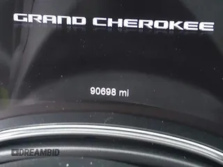 2020 Jeep Grand Cherokee Altitude with VIN 1C4RJEAG3LC202749, listed as a IAAI auction lot 42272959 with 90,698 mi miles and . Bid and sale history available at DreamBid. Image 16.