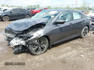 2018 Honda Civic EX-T z VIN 2HGFC1F34JH643975, wystawiony jako IAAI lot #42209799 z przebiegiem 58 684 mil mil oraz . Historia ofert i sprzedaży dostępna na DreamBid. Obrazek 2.
