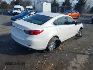 2016 Mazda Mazda6 i Sport with VIN JM1GJ1U55G1484856, listed as a IAAI auction lot 41543599 with 78,486 mi miles. Bid and sale history available at carsss.com. Image 4.