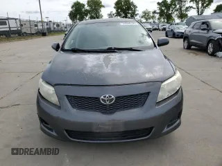 2010 Toyota Corolla with VIN 1NXBU4EE0AZ279996, listed as a Copart auction lot 52046195 with 244,615 mi miles and Salvage Title. Bid and sale history available at carsss.com. Image 5.