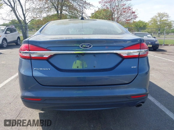 2018 Ford Fusion SE z VIN 3FA6P0H74JR176113, wystawiony jako IAAI lot #42074916 z przebiegiem 78 940 mil mil oraz . Historia ofert i sprzedaży dostępna na DreamBid. Obrazek 16.