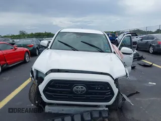 2019 Toyota Tacoma SR с VIN 5TFAX5GN0KX155401, выставлен на аукционе IAAI как лот 42753025 с пробегом 51 913 миль миль и . История ставок и продаж доступна на DreamBid. Изображение 13.