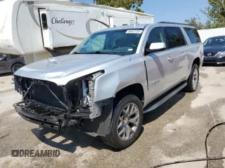 2015 GMC Yukon XL SLE with VIN 1GKS2GKC4FR678777, listed as a Copart auction lot 68642194 with 151,909 mi miles and Salvage Title. Bid and sale history available at carsss.com. Image 1.