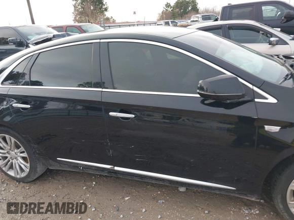 2018 Cadillac XTS Luxury with VIN 2G61M5S31J9135706, listed as a IAAI auction lot 41572396 with 140,539 mi miles. Bid and sale history available at carsss.com. Image 13.