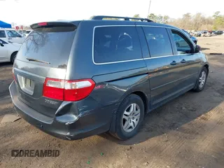 2005 Honda Odyssey EX-L with VIN 5FNRL38615B040637, listed as a IAAI auction lot 41920622 with 92,673 mi miles. Bid and sale history available at carsss.com. Image 4.