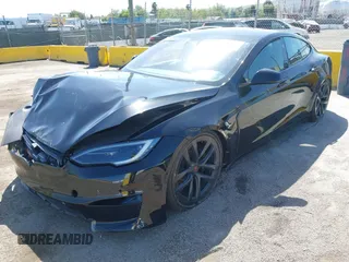 2022 Tesla Model S Plaid with VIN 5YJSA1E61NF483354, listed as a IAAI auction lot 41973636 with 32,541 mi miles and . Bid and sale history available at DreamBid. Image 20.