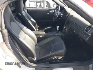 2007 Porsche Boxster с VIN WP0CA29837U710558, выставлен на аукционе IAAI как лот 42506943 с пробегом 129 446 миль миль и . История ставок и продаж доступна на DreamBid. Изображение 5.
