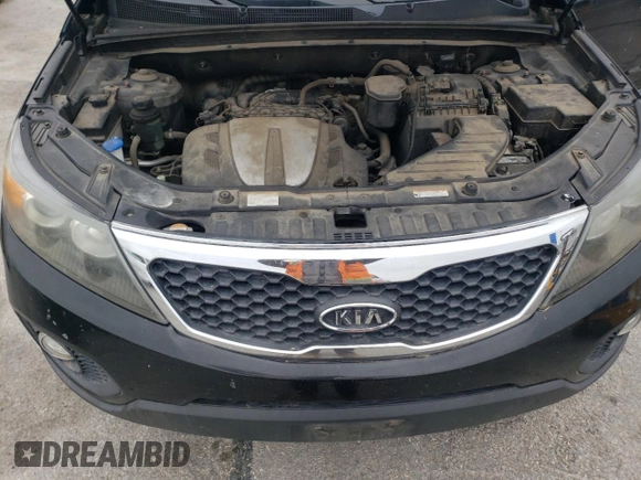 2011 Kia Sorento LX with VIN 5XYKT4A2XBG182097, listed as a Copart auction lot 49709605 with 193,989 mi miles and Salvage Title. Bid and sale history available at DreamBid. Image 12.